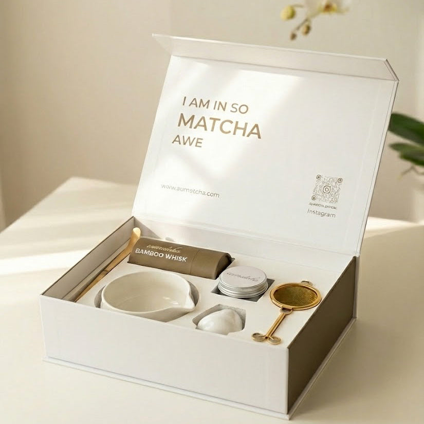 Matcha tea gift set with packaging on a light surface